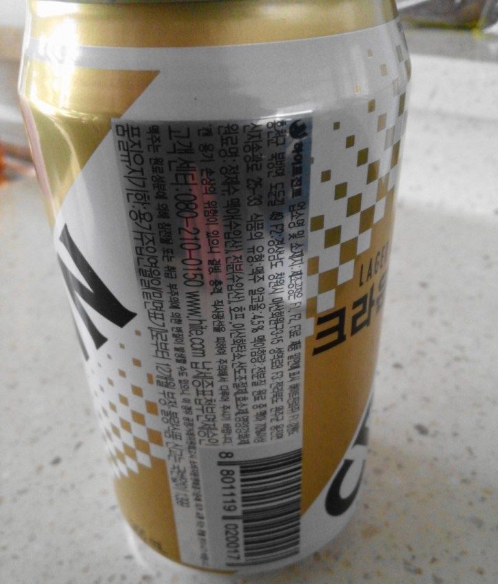 a can of soda sitting on top of a counter