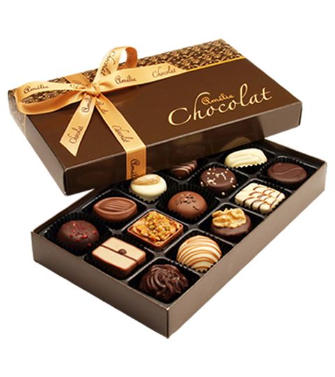 a chocolate box filled with lots of different types of cookies