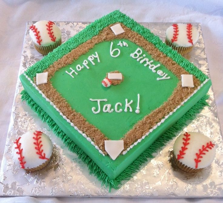 a baseball themed birthday cake with cupcakes on the plate and frosting that says happy 6th birthday jack