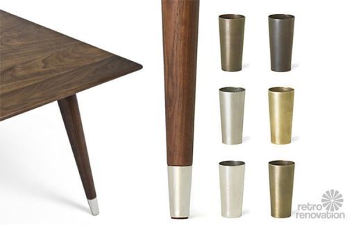 several different types of cups sitting on top of a wooden table next to each other