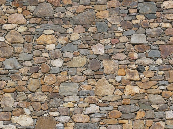 an image of a stone wall that looks like it could be made out of rocks