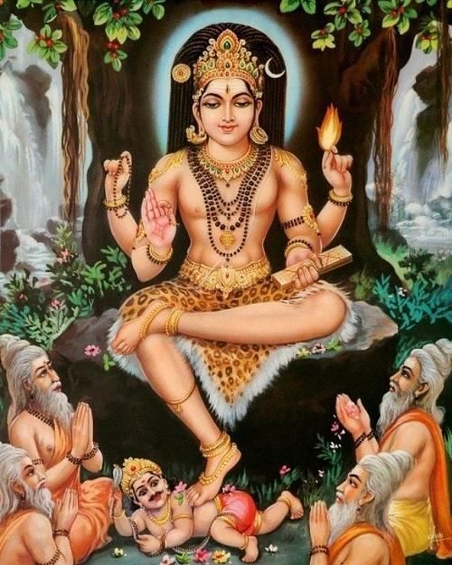 the hindu god sitting in front of his family