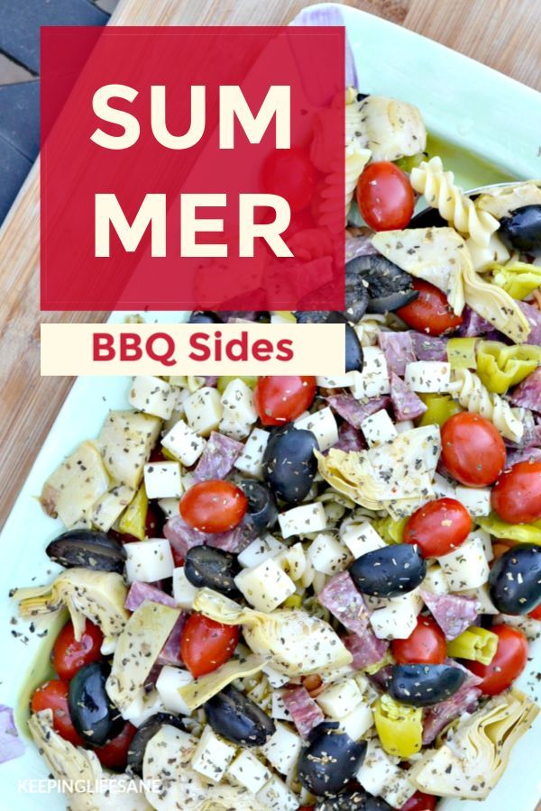 a white plate topped with pasta salad next to a red sign that says summer bbq sides