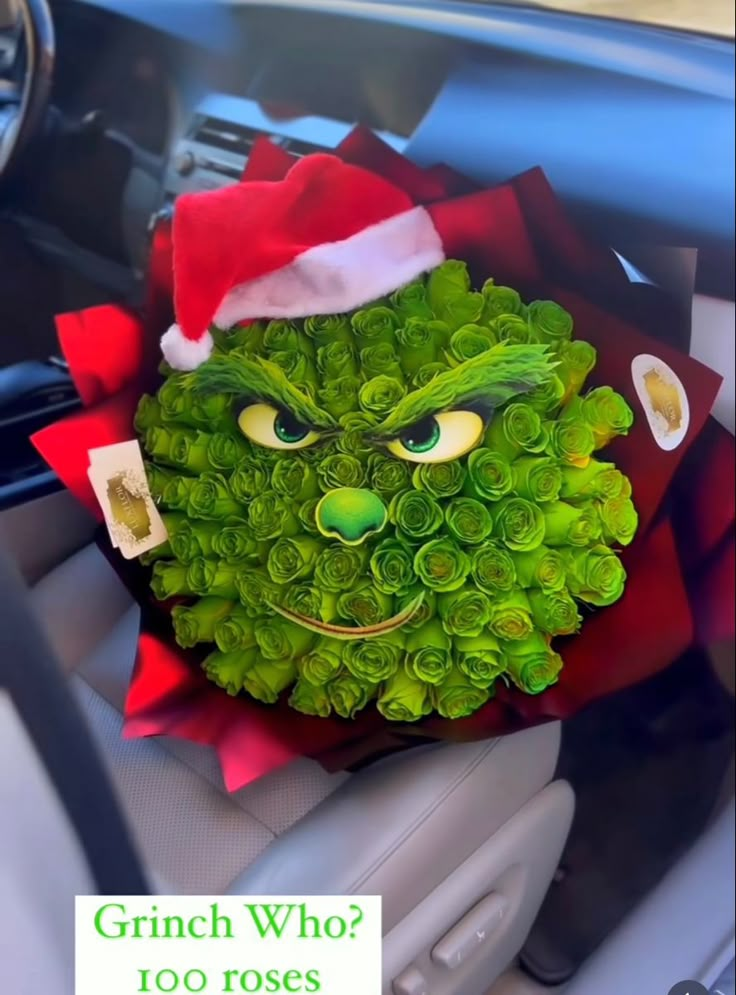 a car decorated for christmas with a grin face