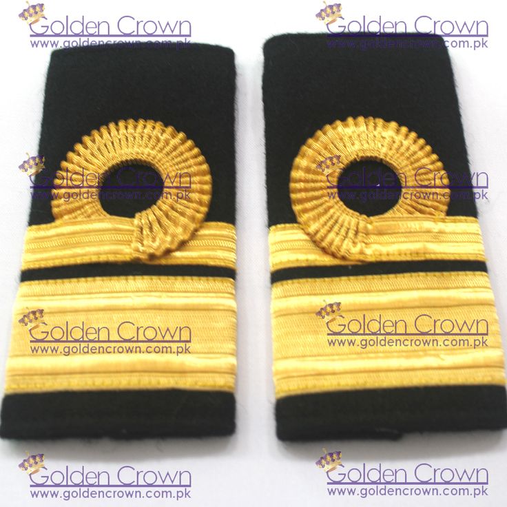 two black and gold ribbons with a golden crown on them are sitting next to each other