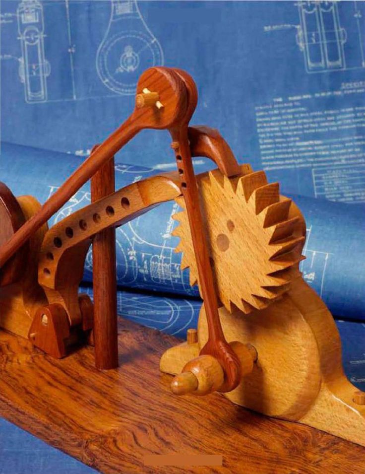 a wooden toy that is sitting on a table