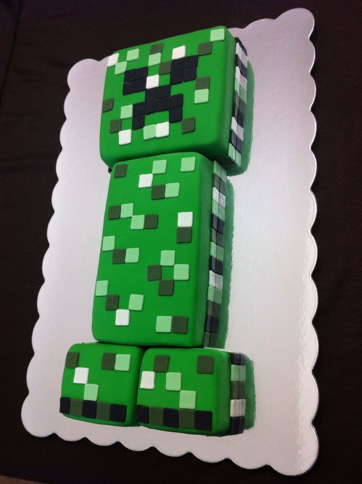 a cake made to look like the number one from minecraft is stacked on top of each other