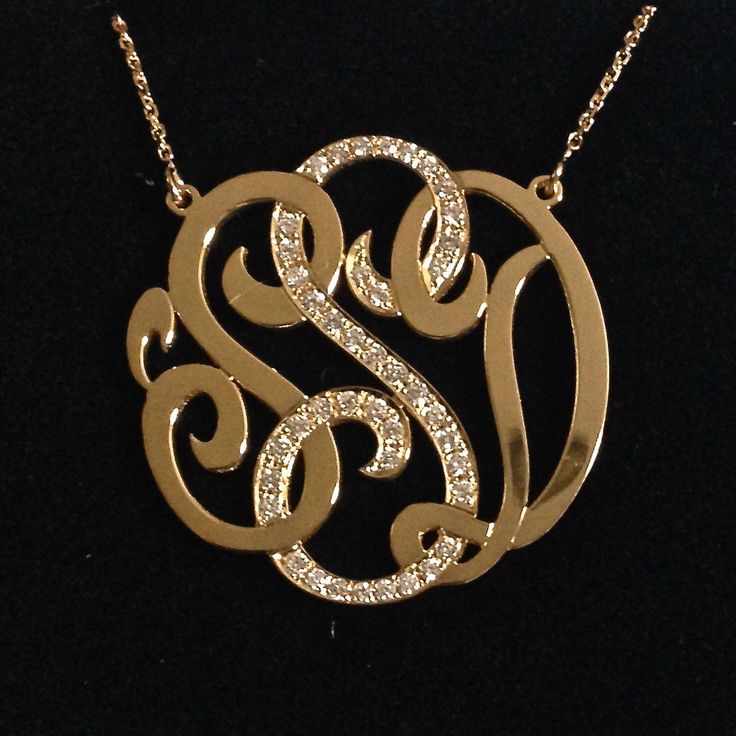 "A very special version of our medium (1.25\") monogram necklace! In this absolutely stunning necklace, the center initial is covered with beautiful F-G color, VS1-VS2 clarity diamonds. The total carat weight and count of the diamonds will vary slightly depending on which letter the center initial is. The H in the necklace pictured is covered in 82 diamonds with a weight of 0.50 ct. Also, the 14k gold plate is significantly thicker and heavier than the plate used for our traditional monograms. T Luxury Sterling Silver Initial Necklace With Monogram, Luxury Sterling Silver Monogram Initial Necklace, Elegant White Gold Initial Necklace As Personalized Gift, Elegant White Gold Initial Necklace For Personalized Gift, Elegant Personalized Initial Necklace For Formal Occasions, Classic Diamond Monogram Jewelry, Classic Monogram Diamond Jewelry, Luxury Personalized Diamond Necklace With Initial Pendant, Monogram Diamond Jewelry For Weddings