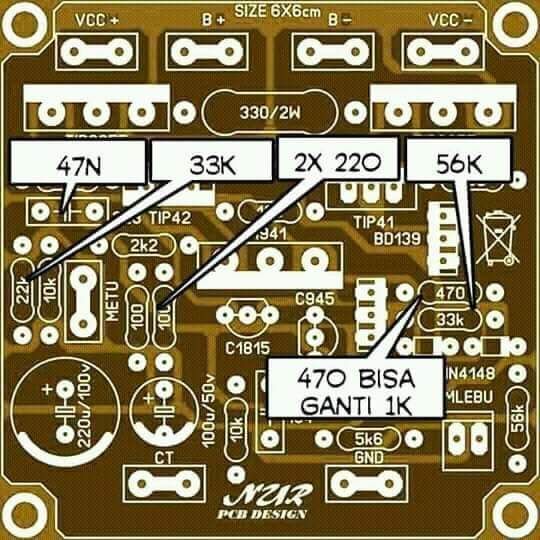 an electronic circuit board with various parts labeled in white and black on the front side