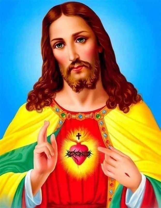 the jesus is holding his heart with both hands