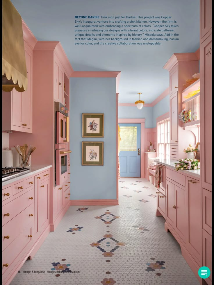 a pink kitchen with blue walls and white tile flooring is featured in the magazine