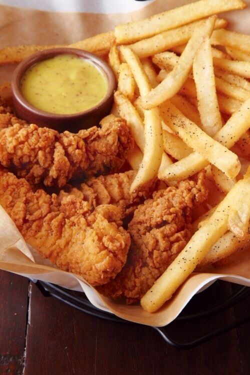 fried chicken and french fries with dipping sauce