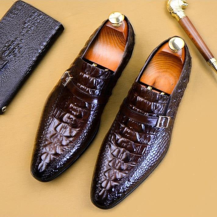 Elevate your style with our exquisite Luxury CrocLeather Buckle Strap Oxford Dress Shoes, crafted with the finest genuine cow leather for a touch of luxury. Not only do these shoes exude sophistication with their solid pattern and pointed toe shape, but they also prioritize comfort with their soft cow leather lining and cushioned full grain leather insole. Perfect for any occasion, these brogue shoes offer a secure and adjustable fit with their buckle strap closure and guarantee durability and traction with their rubber outsole. Don't miss out on the opportunity to make a statement with these versatile and timeless shoes. Order now and experience the perfect blend of style and comfort. Elegant Faux Leather Oxfords With Pointed Toe, Brown Leather Shoes With Leather Sole For Party, Luxury Brown Closed Toe Dress Shoes, Elegant Red Monk Strap Shoes With Plain Toe, Elegant Leather Monk Strap Shoes For Party, Elegant Pointed Toe Faux Leather Oxfords, Formal Faux Leather Shoes With Round Toe, Brown Faux Leather Oxfords For Formal Occasions, Luxury Slip-on Leather Shoes For Semi-formal Occasions