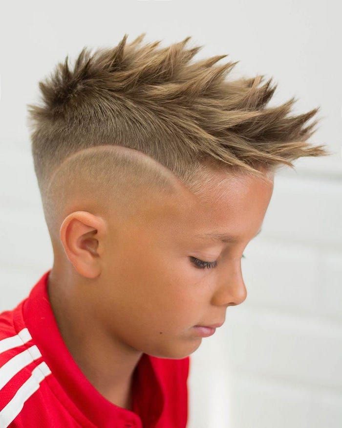 blonde-hair-spiked-mohawk-undercut-red-sweatshirt-nice-haircuts-for-men-white-background Cool Kids Haircuts, Trendy Boys Haircuts, Boys Fade Haircut, Boys Haircut Styles, Soccer Hairstyles, Mohawk Haircut, Boy Haircuts Short