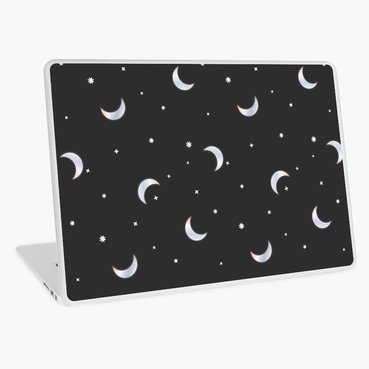 the night sky is full of stars and crescents on black laptop skin for the apple macbook air