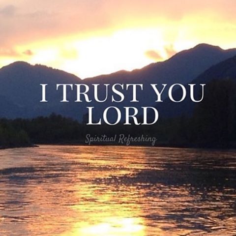 the words i trust you lord are in front of a river with mountains behind it