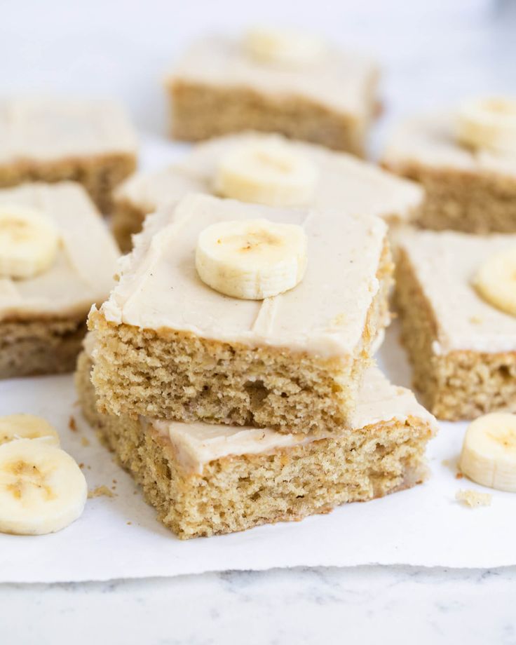 several pieces of cake with bananas on top