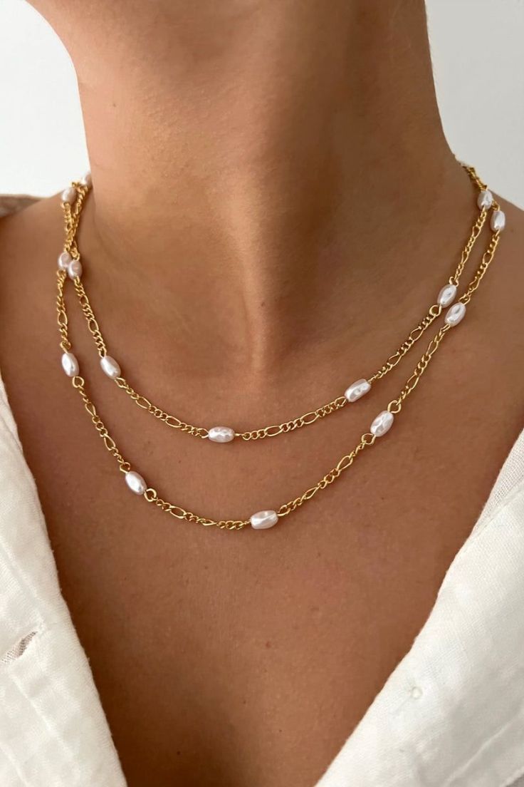 small pearls on a gold chain necklace. Great layering necklace that is simple and modern for everyday wear. It can go with so many outfits, day to night. Trendy 16 Inch Jewelry Gift, Elegant Multi-strand Pearl Necklace, Trendy Adjustable Multi-strand Jewelry, Elegant Multi-strand Delicate Chain Jewelry, Multi-strand Gold Pearl Chain Jewelry, Gold Multi-strand Pearl Chain Jewelry, Silver Double Strand Necklaces With Delicate Chain, Pearl Clavicle Chain Jewelry With Round Beads, Pearl Clavicle Chain With Round Beads