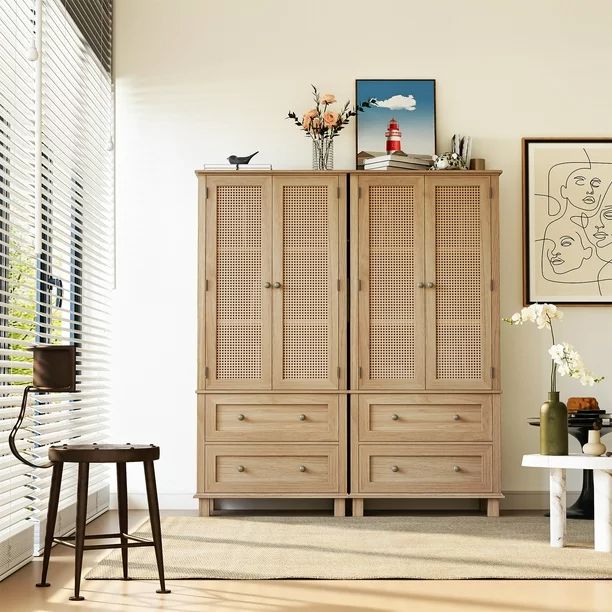 a living room with white walls and wooden furniture in the corner, along with pictures on the wall