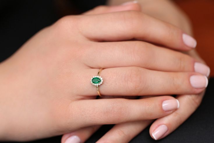 "Emerald Ring / 14k Classic Oval Cut Emerald Ring with Surrounding Diamonds / Natural Emerald Ring in 14k Solid Gold / Mothers Day Gift * If you would like to see the Matching Earrings Please Click Below https://www.etsy.com/listing/604292239/emerald-earrings-14k-oval-cut-emerald?ref=related-4 * If you would like to see the Matching Necklace Please click Below https://www.etsy.com/listing/590436480/emerald-necklace-14k-classic-oval-cut?ref=related-1 Item Features * Made to Order. * Gold KT: 14K Oval Yellow Gold Emerald Ring With Halo, Timeless Oval Cluster Ring In 14k Gold, Timeless 14k Gold Oval Cluster Ring, 14k Gold Oval Halo Ring, 14k Gold Halo Ring With Oval Shape, Dainty Oval Emerald Ring For Anniversary, Oval Yellow Gold Cluster Ring For Proposal, Oval Yellow Gold Cluster Ring In Fine Jewelry Style, Heirloom 14k Gold Oval Halo Ring