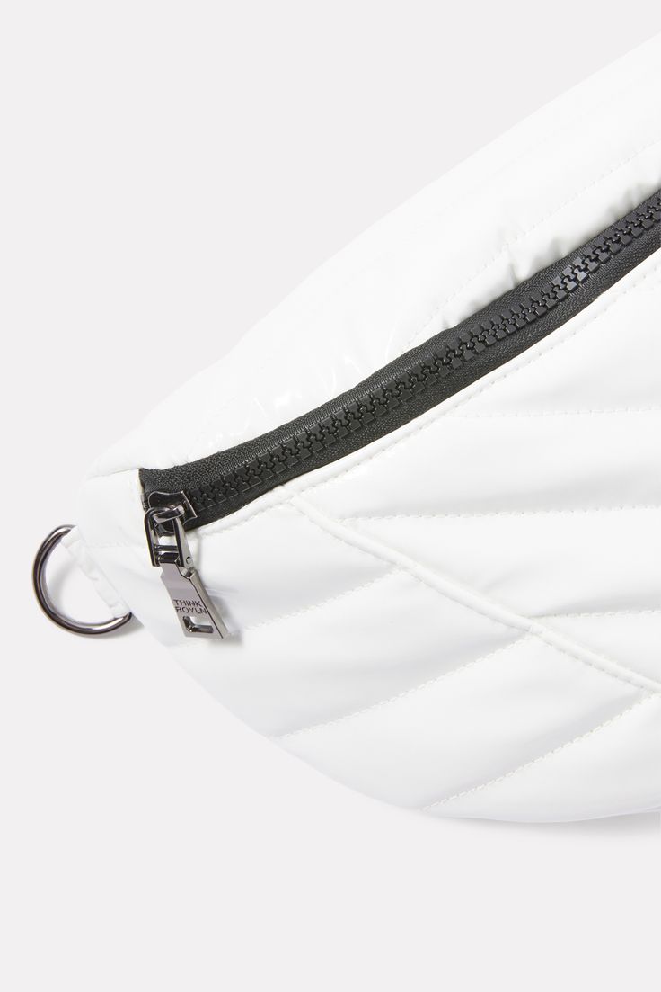 The Little Runaway by Think Royln features a polyester fabric with a light-weight polyester fill, a front, and back zipper closure, and 2 adjustable and detachable crossbody straps. White Nylon Shoulder Bag With Removable Pouch, Sporty White Nylon Shoulder Bag, White Nylon Crossbody Shoulder Bag, White Bags With Zipper Closure For Outdoor Activities, White Nylon Shoulder Bag For On-the-go, White Nylon Bag With Removable Pouch, White Outdoor Bag With Zipper Closure, White Nylon Bag With Zipper Closure, Outdoor White Shoulder Bag With Zipper