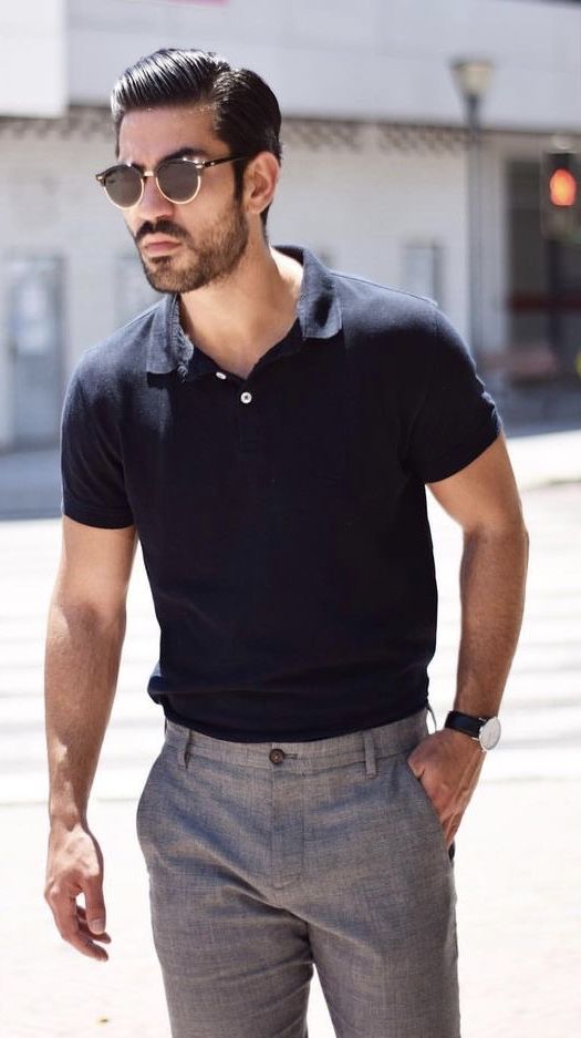 Summer outfit idea black polo shirt gray trousers wayfarer style sunglasses black leather banded watch. model unknown. #summerstyle #summeroutfits #poloshirt #menswear #menstyle #mensfashion Men’s Polo Outfit, Black Polo Outfit Men, Black Polo Outfit, Gray Trousers, Polo Shirt Outfits, Shirt Outfit Men, Polo Outfit, Mens Fashion Work, Mens Summer Outfits