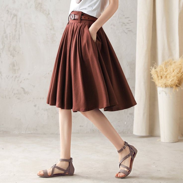 "DETAIL * 50% linen, 50% cotton * Right hidden zipper closure * Knee length * Pockets available * Pleated skirt * Perfect for spring, summer * Wash by hand or machine with cold water * The model is 168 cm (5′ 6″) tall with a 80 cm (31.5\") bust, 66 cm (26\") waist. She is wearing the brown skirt in size XS. Choose CUSTOM Order if you * Need a better fit * Can't find your size in our size Chart * Change the Style * Chang the Length * Your Height is not Between 5'1\" - 5\"9\" * Your weight from 47 Retro Pleated Mini Skirt For Spring, Brown A-line Skirt For Summer, Summer A-line Skirt With Accordion Pleats, Retro Knee-length Skirt For Summer, Retro Knee-length Summer Skirt, Summer Pleated Brown Skirt, Vintage Long Skirt With Relaxed Fit, Knee-length Bottoms With Accordion Pleats For Summer, Vintage Long Gathered Skirt Bottoms