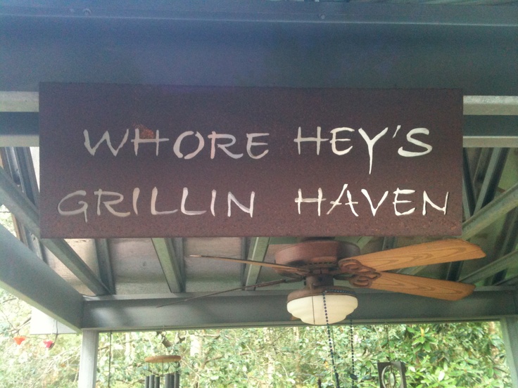 a sign that says, where hey's grillin haven on the ceiling