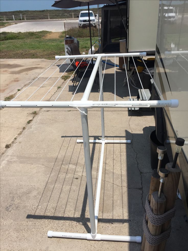 an umbrella is attached to the side of a trailer