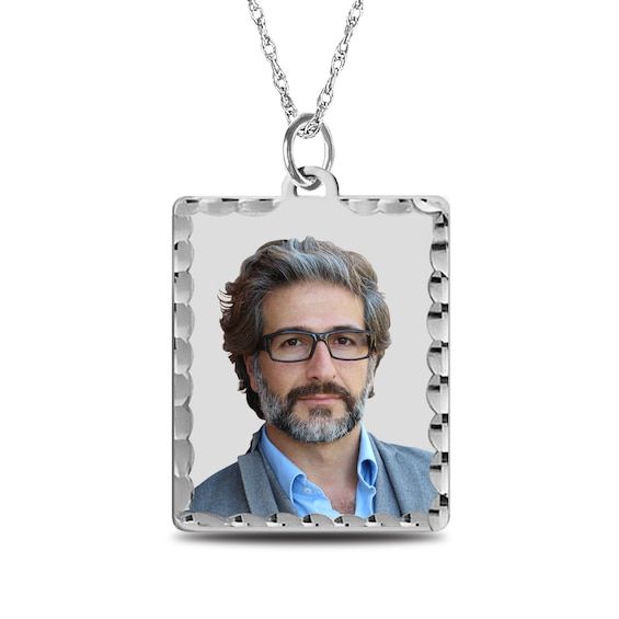 Turn one of your favorite memories into a treasured keepsake - this personalized and engravable rectangular photo pendant with diamond-cut edges. Crafted in sterling silver This rectangular pendant with a diamond-cut frame showcases your photo - expertly transferred using modern technology, and is scratch resistant, 100% waterproof and available in high resolution color or black and white. Further customize the look with up to three lines of sweet messages or meaningful phrases - each 20 charact Anniversary Jewelry With Rectangular Polished Pendant, Engraved Rectangular Jewelry For Father's Day, Rectangular Engraved Jewelry For Father's Day, Gift Necklace With Polished Finish And Rectangular Pendant, Engraved Square Pendant Necklace For Anniversary, Father's Day Rectangular Jewelry With Engraving Option, Personalized Square Pendant Jewelry For Anniversary, Engraved Rectangular Pendant Jewelry Gift, Father's Day Gift Jewelry With Rectangular Pendant