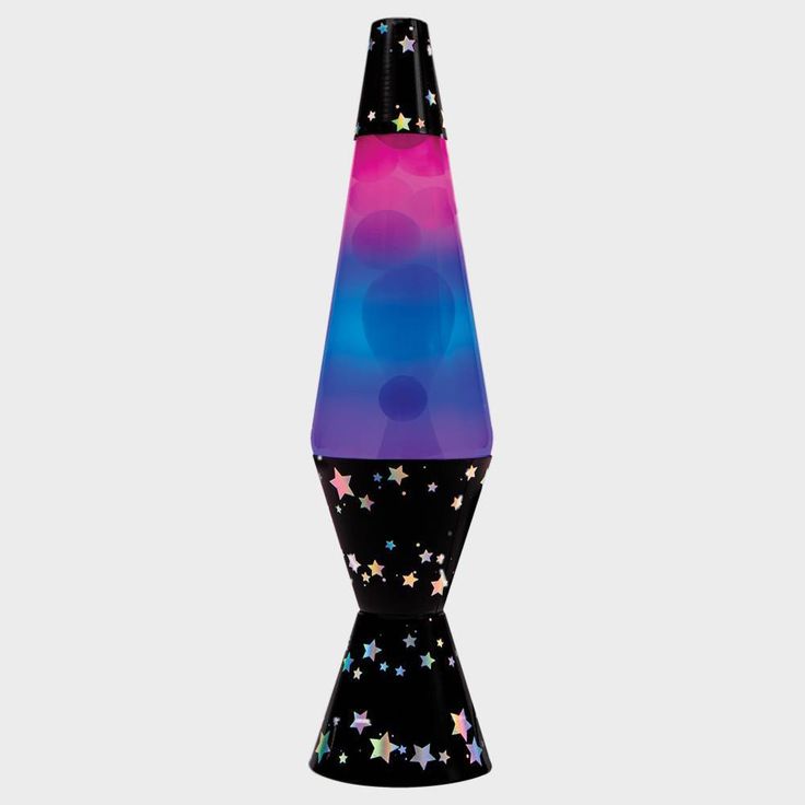 a colorful vase sitting on top of a black table next to a white wall and floor