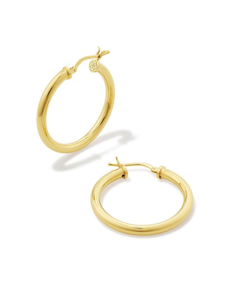 Don’t freak out, but you’ve found it: it’s the ideal hoop earring! Our Tube Medium 30mm Hoop Earrings in 18k Gold Vermeil have a classic hoop silhouette, are crafted with elevated materials, and they’re hollow for lightweight wear. What’s not to love? You’ll be wearing these again and again (and again). Metal 18k Yellow Gold Vermeil What is Vermeil? Vermeil (that’s pronounced ver-may) is a gold plating technique that dates back to the 19th century. While other jewelers plate over less durable metals, our vermeil starts with a Sterling Silver base and is plated with just over 2.5 microns of 18k Gold to create a more timeless piece, worthy of the Demi-Fine name. Learn More About Metals & Care Closure Ear Post Size 1.181" Outer DiameterDue to the one-of-a-kind nature of the medium, exact colo Kendra Scott Ring, Double Band Ring, Plating Techniques, Double Band Rings, Demi Fine Jewelry, Jewelry Earrings Hoops, The Medium, Again And Again, Kendra Scott