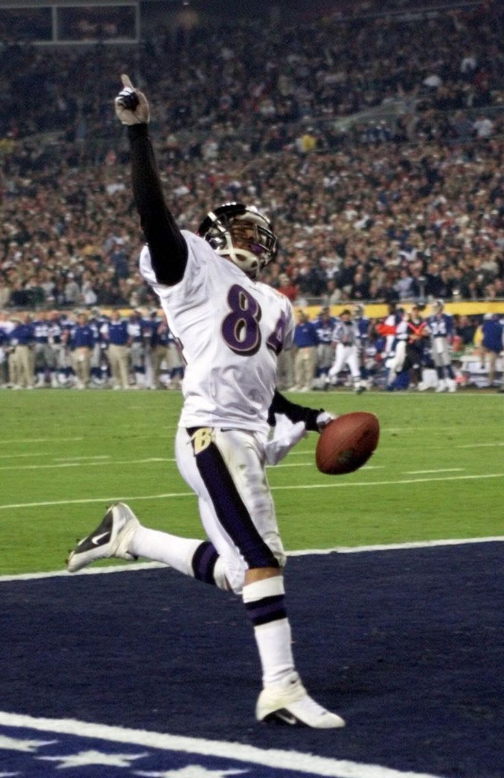 a football player is running on the field