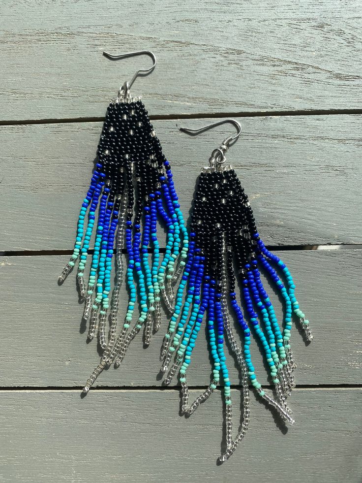 Blue Beaded Fringe Tassel style Earrings FREE SHIPPING IN USA  **A portion of every sale will directly benefit homeless women in the ATX community. Thank you for choosing SoyJuju! Check out our store for more colors Blue Beaded Earrings With Dangling Beads For Festival, Blue Beaded Dangling Earrings For Festivals, Blue Beaded Fringe Earrings For Festival, Blue Dangling Beads Earrings For Festival, Blue Beaded Drop Earrings For Festival, Blue Bohemian Beaded Dangle Earrings, Adjustable Blue Beaded Fringe Earrings, Bohemian Blue Earrings With Beaded Fringe, Blue Bohemian Beaded Fringe Earrings