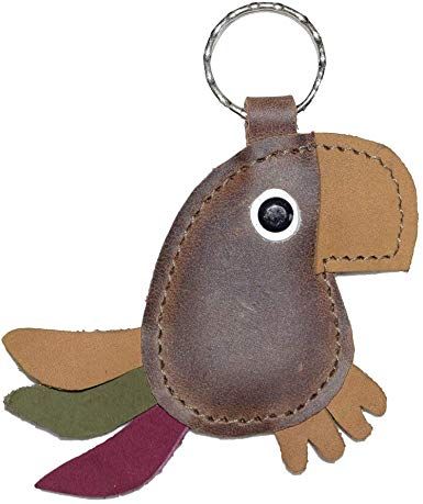 a leather key chain with a bird on it