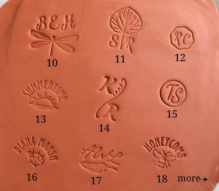 the numbers and symbols are carved on this clay plate for carving or embossing