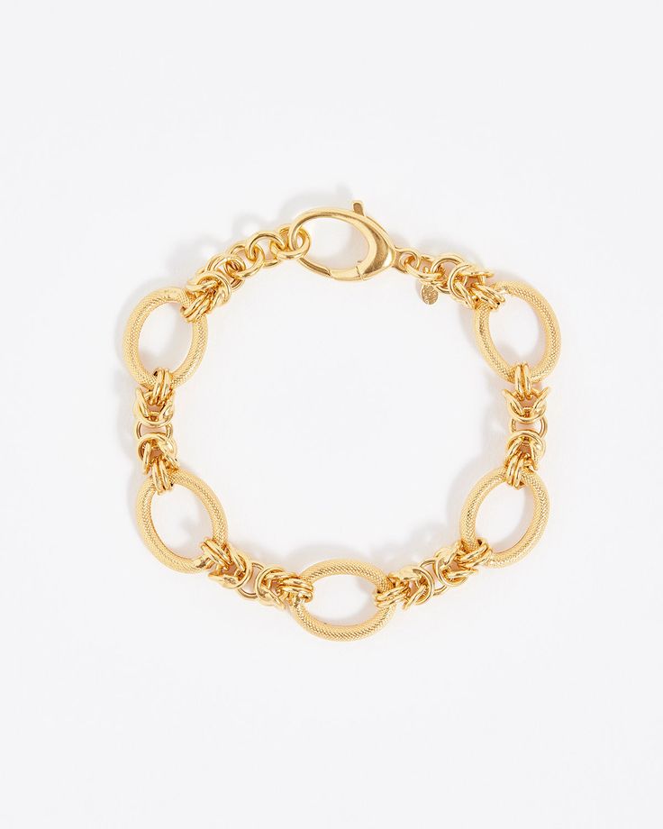 Knotted gold chain sits between textured oval links creating a versatile bracelet with modern elegance.Materials18ct gold plated silverBracelet length (approx)17.5cm 2cm extender Gold-tone Chunky Chain Bracelet With Oval Links, Modern Gold Chain Bracelet With Hook And Links, Elegant Charm Bracelet With Chunky Oval Links, Gold Link Bracelet With Hook And Links, Gold Metal Bracelets With Cable Chain, Gold-tone Gold Bracelet With Chunky Oval Link Chain, Elegant Chain Bracelet With Hooks And Links, Gold Cable Chain Metal Bracelets, Gold Charm Bracelet With Chunky Oval Link Chain