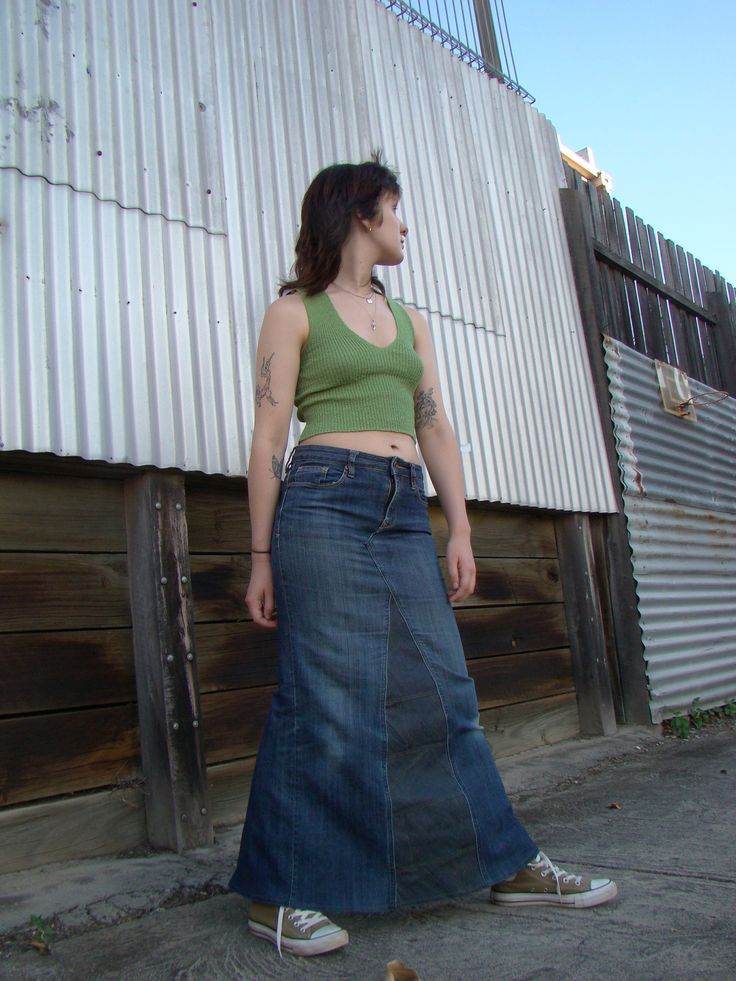 "This piece that was once a pair of trousers has now been fashioned into a maxi skirt (I kept on calling it a dress before my partner told my dumbass otherwise). With an open back for ease of movement and a contrasting front patchwork, you get that upcycled look without that upcycled quality, because I can sew, fairly well, apparently.  MEASUREMENTS AND WHATNOT. 100% Cotton. WAIST: 26\" LENGTH: 35\" HIPS: 34\" LEG OPENING: 22\" UPCYCLED AND DESIGNED BY PRICE #handmade #Patchwork #upcycled #Maxiskirt #Denim" Upcycle Jeans Skirt Maxi, Casual Fitted Skirt Reworked, Casual Fitted Upcycled Denim Skirt, Spring Reworked Fitted Skirt, Fitted Cotton Skirt With Reworked Details, Spring Fitted Upcycled Skirt, Fitted Full-length Dark Wash Skirt, Spring Fitted Reworked Denim Skirt, Full Length Fitted Cotton Denim Skirt