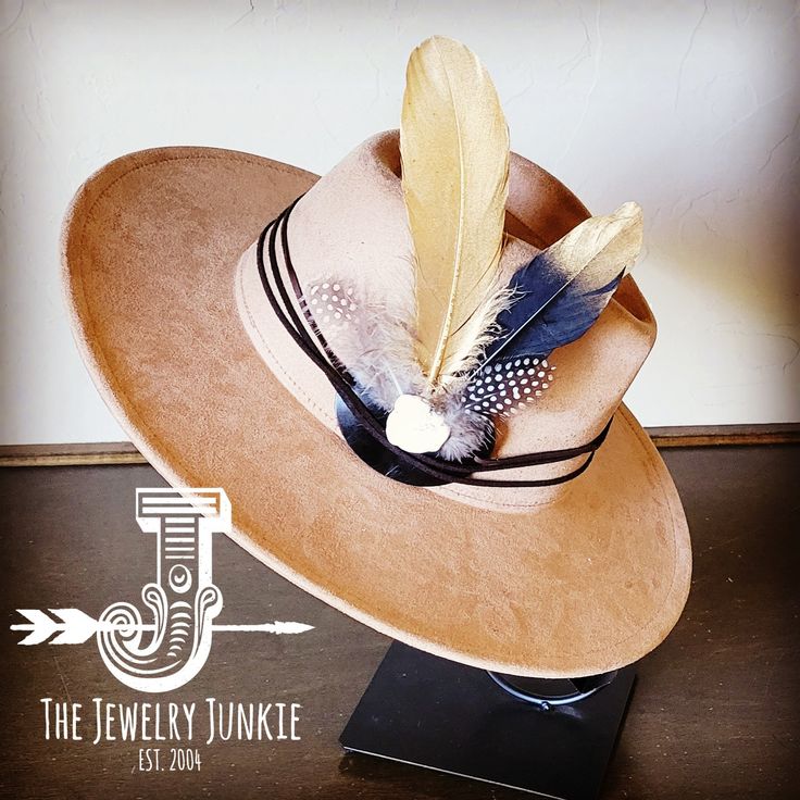 If you’re looking for the perfect accessory to complement your favorite boho style, look no further. This Boho-Style Western Felt Hat w/ Natural Feather & Turquoise Hat Accent by The Jewelry Junkie is absolutely everything that you need. Not only is it easy to incorporate into any and all outfits, but the genuine leather and natural feathers of the band immediately elevate whatever it is you’re wearing. One Size Hat with adjustable inner hat liner (see last photos) The same primary feathers will Bohemian Fedora For Kentucky Derby And Rodeo, Bohemian Felt Hat For Kentucky Derby Rodeo, Bohemian Felt Hat For Kentucky Derby And Western Events, Bohemian Felt Hat For Kentucky Derby, Bohemian Wide Brim Felt Hat For Ranch, Bohemian Felt Hat For Western-themed Fall Events, Bohemian Fedora For Western-themed Events, Bohemian Adjustable Felt Hat For Kentucky Derby, Bohemian Adjustable Hat For Kentucky Derby