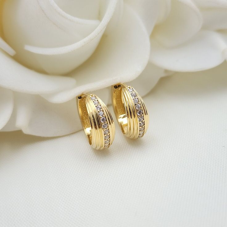 Stunning solid 14k yellow gold huggies earrings. This unique design is perfect for everyday and everywhere. Elegant, shint and everlasting. Huggies earrings sit close to the earlobe and will also fit in girls. No need to take off to sleep, to shower to run, etc. 14k gold will not tarnish or rust. Perfect gift.  Materials: 14k gold , Cubic zirconia. Diameter: 14mm Thickness: 5mm Weight: 2.9 grams 14k stamped (585) Brand new  Fast shipping Gift box included 💓 Briza Collections is a small family b 2 Grams Gold Ear Rings, Earrings Design Gold New Model, Tarnish Resistant Huggie Earrings For Formal Occasion, Formal Tarnish-resistant Huggie Earrings, Tarnish Resistant 14k Gold Huggie Earrings For Formal Wear, Formal 14k Gold Durable Huggie Earrings, Classic Gold Diamond Earrings, Tarnish Resistant, Formal Huggie Earrings, Elegant Tarnish Resistant Huggie Earrings For Anniversary