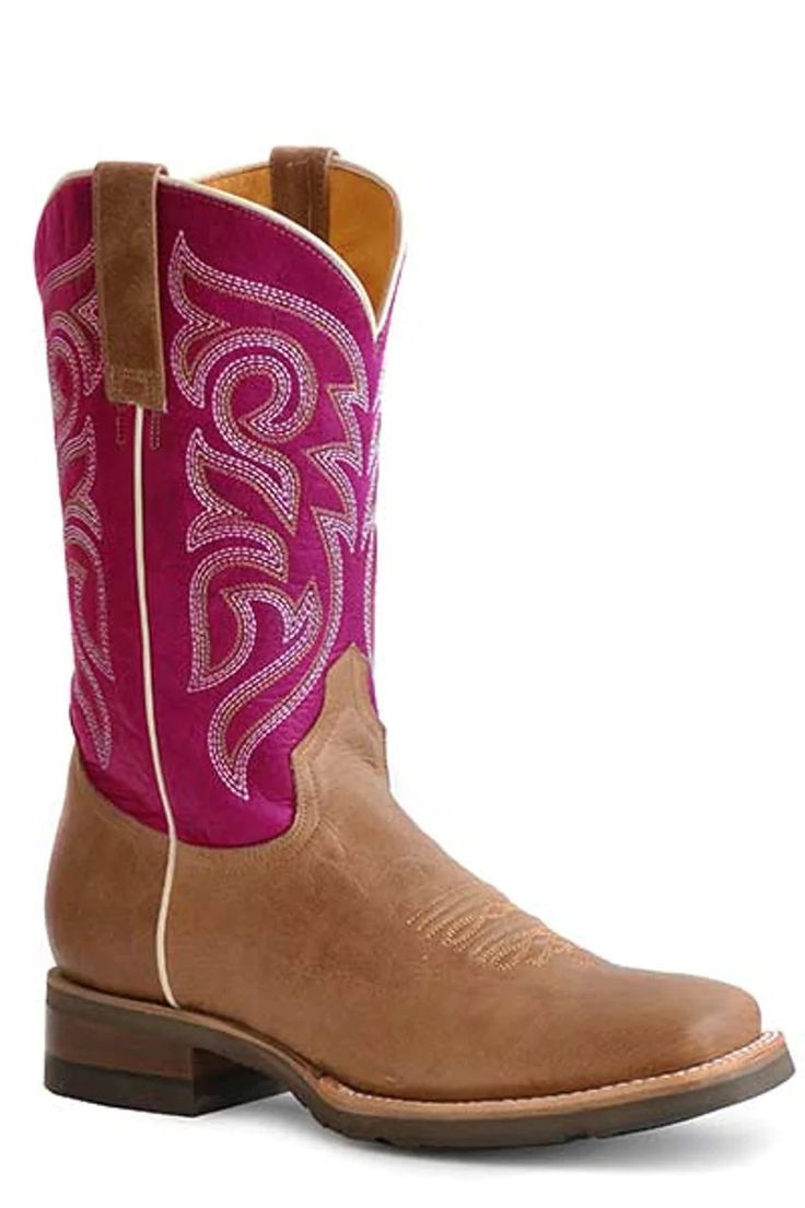 Check out this great looking pair of boots by Roper! This is a great riding/barn boot or just a nice everyday square toe boot for rocking with your favorite jeans. Square Toe Burnish Tan Leather Vamp Embroidered Pink Leather 11" Shaft Double ¾ Welt Sole With Nails Walking Heel Rest Removeable Insole All Leather Lining Handcrafted Boot GEO Outsole 11” Shaft Height 15" Circumference of calf Measurements for this boot were taken from a size 8. Please note that measurements may vary by size. Western Riding Boots For Fall, Western Mid-calf Boots With Square Toe And Reinforced Heel, Country Style Fitted Boots With Square Toe, Western Fitted Mid-calf Boots With Square Toe, Country Style Fitted Square Toe Boots, Western Style Pink Mid-calf Boots, Pink Fitted Western Mid-calf Boots, Western Style Fitted Pink Mid-calf Boots, Square Toe Boots For Ranch In Fall