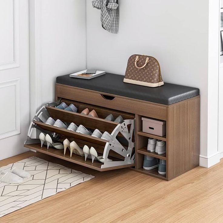 a shoe rack with several pairs of shoes on it and a purse hanging from the wall