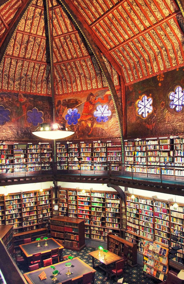 the inside of a library filled with lots of books