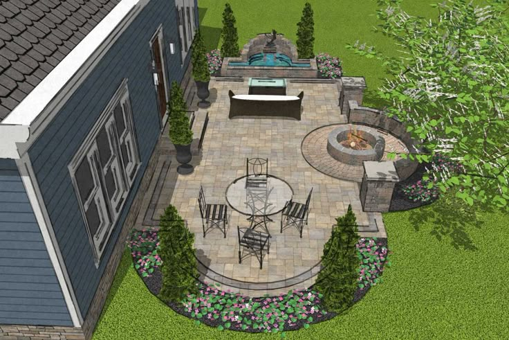 an aerial view of a patio and fire pit in the back yard with seating area