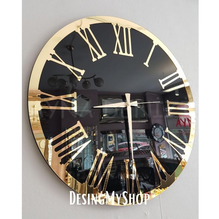 a clock that has roman numerals on it