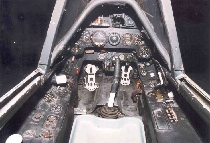 the cockpit of an airplane with various controls