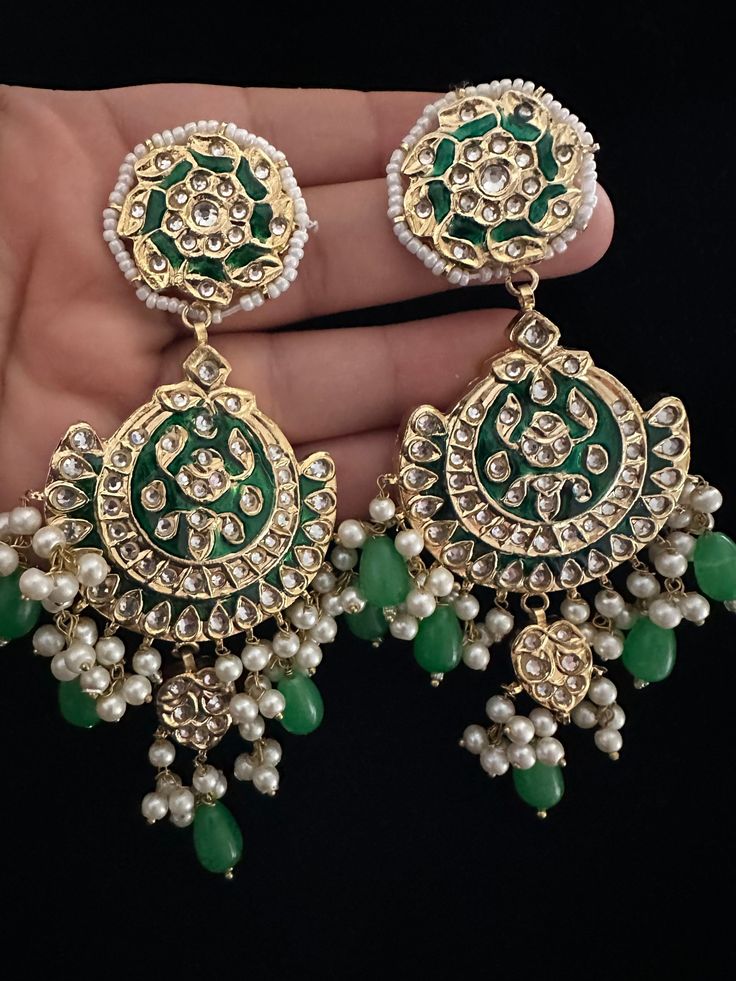 It's time you level up your jewelry box! Add in some extra ordinary piece in your collection! This majestic 22 KT gold plated lock thappa kundan chandbali earrings with beautiful combination of hand painted meena work and kundan pearl work earrings with sahara. In stock and ready to ship. Color : green Hand Set Chandbali Jhumkas For Festivals, Multani Earrings, Earrings With Sahara, Earrings Chandbali, Kundan Chandbali, Chandbalis Earrings, Work Earrings, Earrings Kundan, Stained Glass Earrings