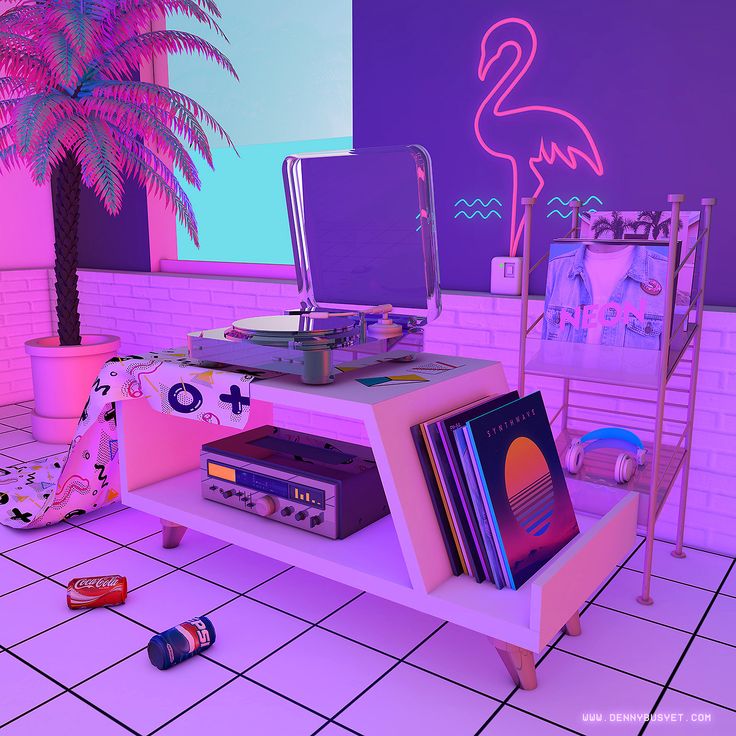 there is a pink flamingo on the wall next to a record player and other items