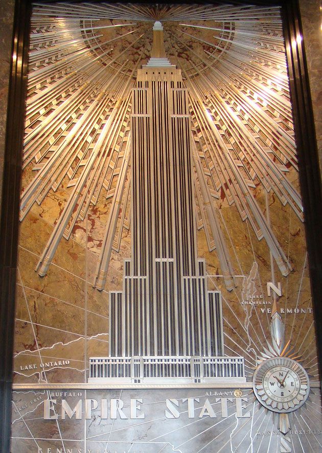 the empire state building in new york city, usa is depicted on a wall mural