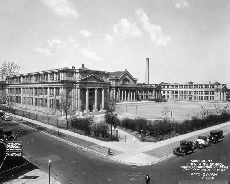 an old black and white photo of a large building